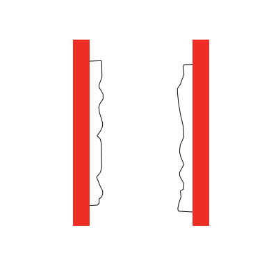 grooves in surface of friction material